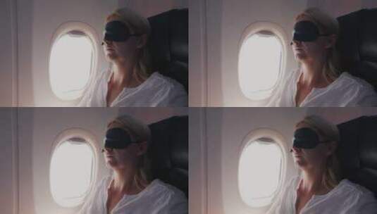 机舱中睡觉的女人高清在线视频素材下载