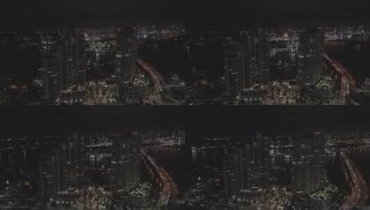 俯瞰夜间的港口和高楼大厦高清在线视频素材下载