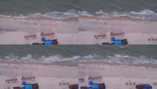 横移俯瞰海浪沙滩游客高清在线视频素材下载