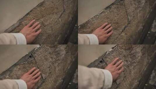 用手触摸石壁高清在线视频素材下载