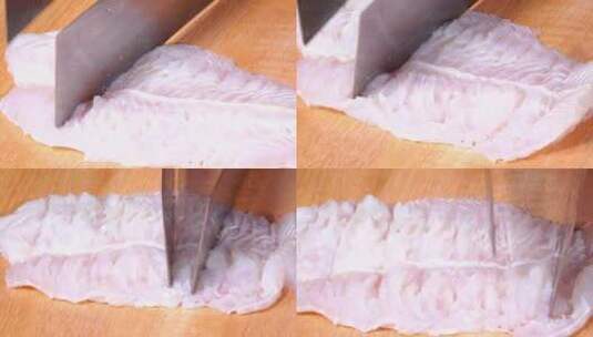 厨师在制作鱼肉丸子剁馅高清在线视频素材下载