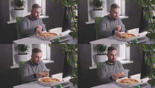 在办公室吃披萨的男人高清在线视频素材下载