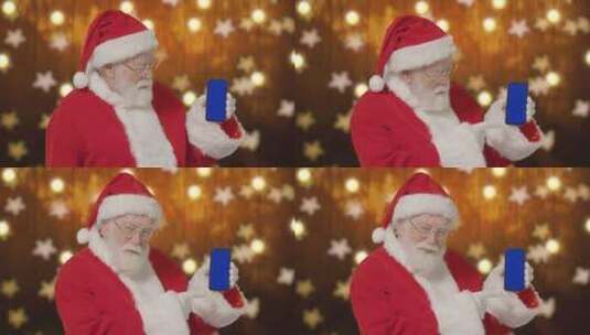 圣诞老人手持蓝屏智能手机高清在线视频素材下载