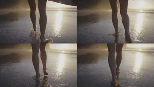 黄昏在沙滩上行走的女人腿部特写高清在线视频素材下载
