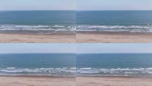 俯瞰大海边海滩海浪拍打沙滩航拍高清在线视频素材下载