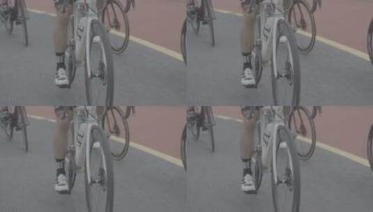 Slog3骑着公路自行车踩踏高清在线视频素材下载