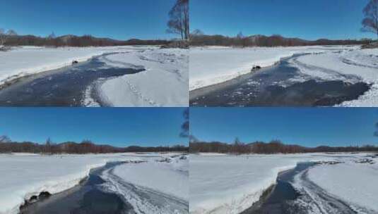 航拍初春库都尔河开河雪景高清在线视频素材下载