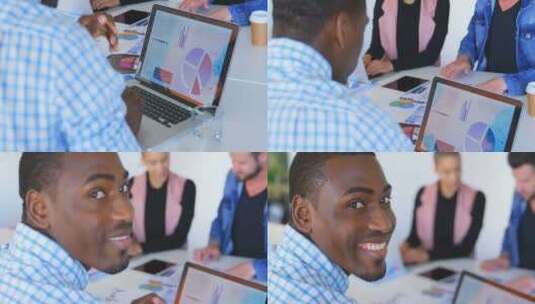 黑人男性在公室使用笔记本电脑高清在线视频素材下载