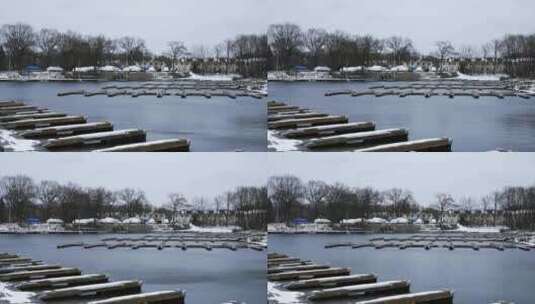 冬天烛木湖上的空船码头高清在线视频素材下载