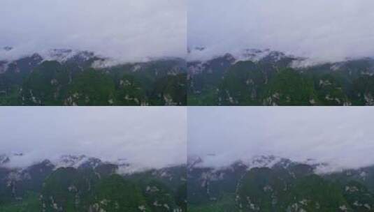 雨中航拍云雾缭绕群山山区山脉山川山峰高清在线视频素材下载