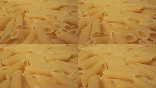 背景用干通心粉面条未煮熟的意大利面特写高清在线视频素材下载
