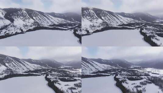 航拍新疆冬季喀纳斯湖雪景雪山森林冰河晨雾高清在线视频素材下载