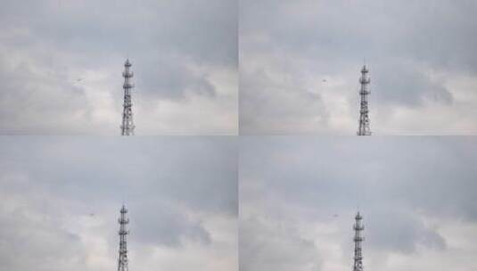 飞机天空飞行穿过信号塔高清在线视频素材下载