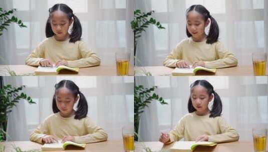 午后在阳光下读书的中国女孩高清在线视频素材下载
