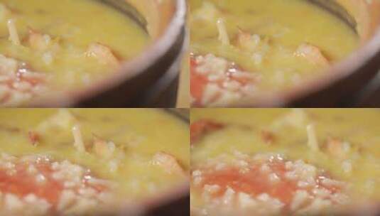 潮汕厨师熬制一碗海鲜粥高清在线视频素材下载