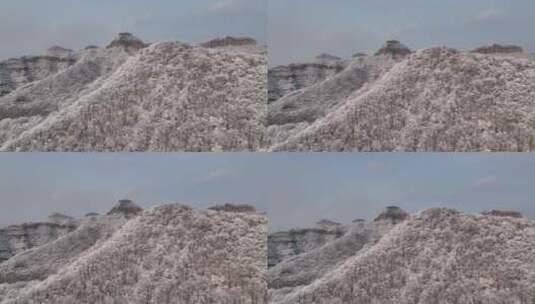 航拍焦作云台山峰林峡山脉冬季雾凇雪景高清在线视频素材下载