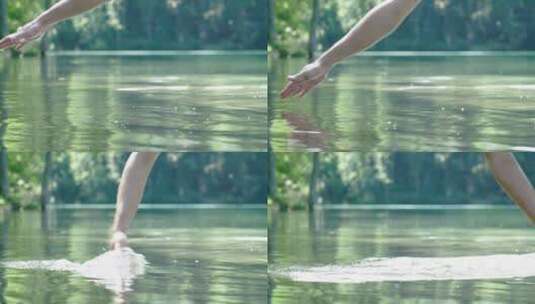 手滑过水面的慢镜头高清在线视频素材下载