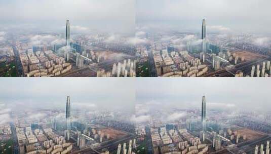航拍云雾中的天津滨海新区周大福金融中心高清在线视频素材下载