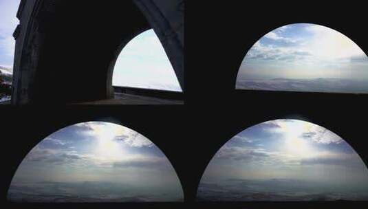 冬季日落时亚美尼亚查伦特拱门的剪影，可以看到雪帽高清在线视频素材下载