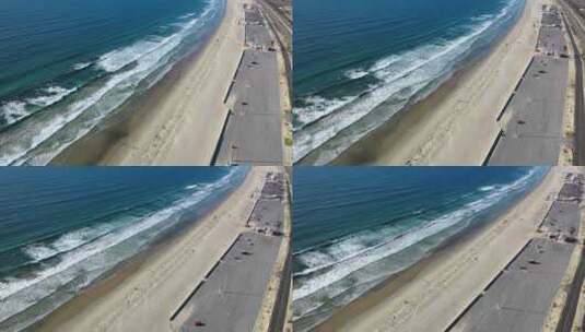 2022年温暖的夏日，在科罗纳多银线海滩的海滩停车场上空，海浪高清在线视频素材下载