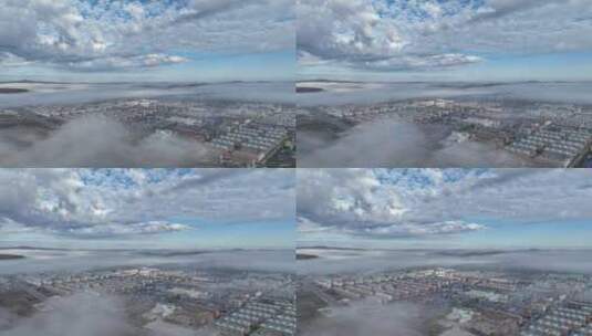 航拍晨雾中的山城高清在线视频素材下载