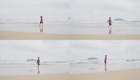 快乐小孩在万宁石梅湾海滩奔跑慢镜头高清在线视频素材下载
