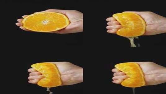 手里捏爆的橙子橙汁高清在线视频素材下载