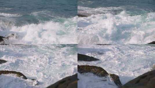 冲击波在锯齿状岩石周围涌动海浪散射阳光动高清在线视频素材下载