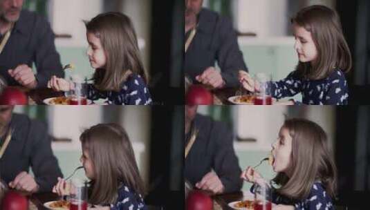 女生吃意大利面波伦亚在厨房桌子上可爱的女高清在线视频素材下载