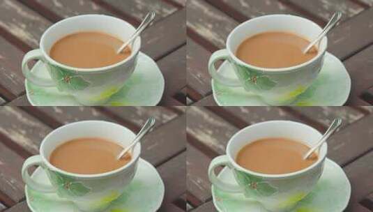 木质桌面上的一杯咖啡高清在线视频素材下载