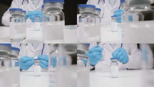 医务人员在施用疫苗小瓶高清在线视频素材下载
