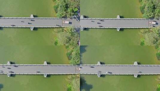 东莞航拍华阳湖湿地公园桥梁俯视左横移高清在线视频素材下载