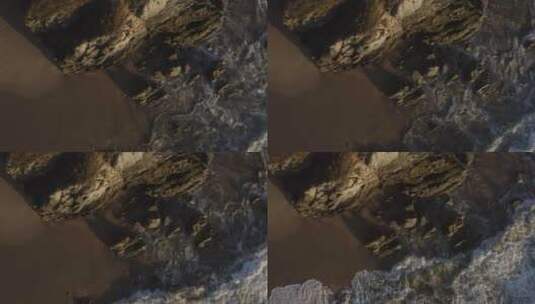 海浪拍打在悬崖上高清在线视频素材下载