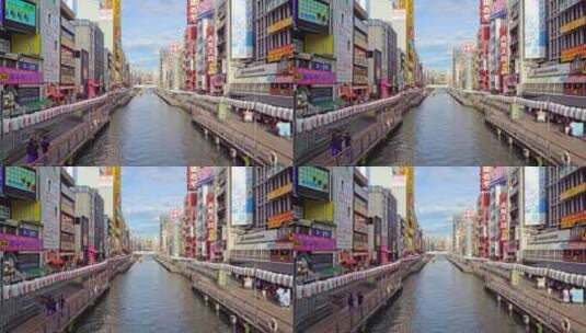 日本大阪市区道顿堀运河两边现代商业建筑高清在线视频素材下载