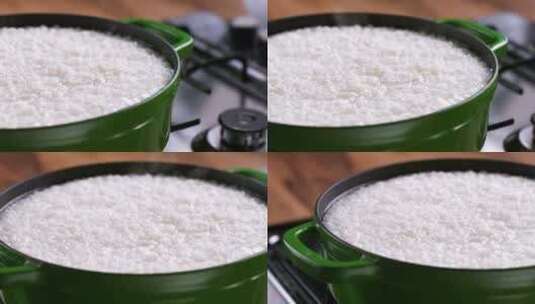 慢动作。米饭要在锅里煮了。高清在线视频素材下载