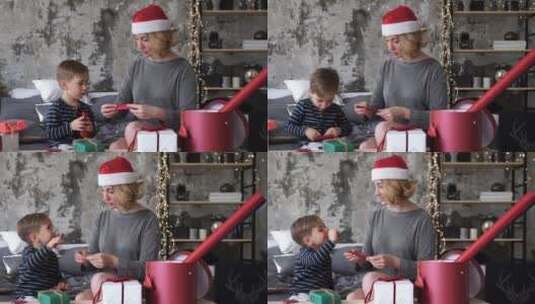 母亲教儿子包装圣诞礼物高清在线视频素材下载