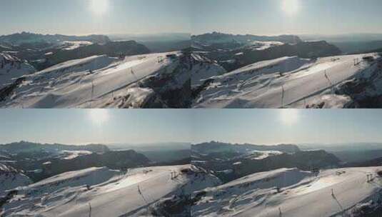 多莉向前无人驾驶飞机在高山滑雪坡上射击高清在线视频素材下载