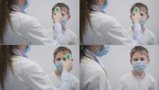 医生用非接触式温度计测量儿童体温高清在线视频素材下载