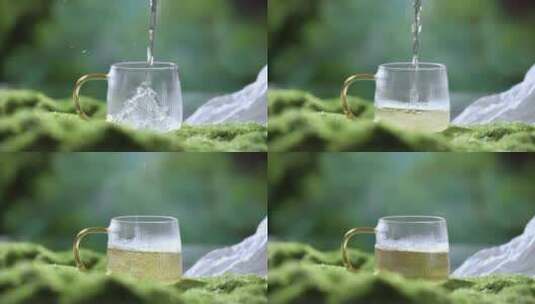 绿茶倒入玻璃杯中升格慢镜头高清在线视频素材下载