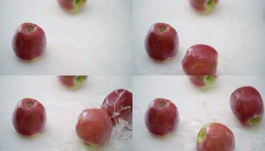 苹果在水中滚动高清在线视频素材下载