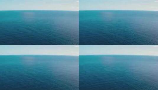 航拍一望无际大海海面万里无云高清在线视频素材下载