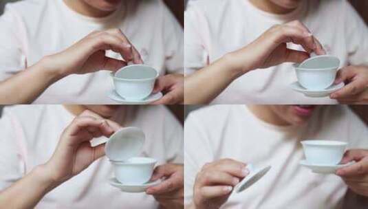 4K升格实拍喝中式盖碗茶的女性特写高清在线视频素材下载