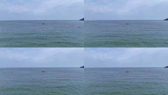 海面上行驶快艇的沿海风景高清在线视频素材下载