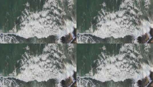 俯拍海浪汹涌冲刷沙滩高清在线视频素材下载