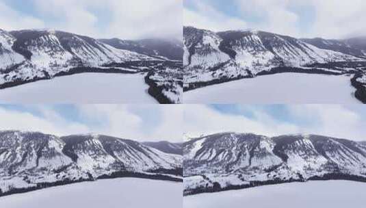 航拍新疆冬季喀纳斯湖雪景雪山森林冰河晨雾高清在线视频素材下载