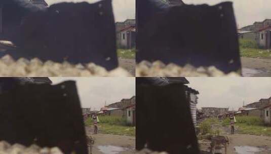 女人站在贫民窟的道路上高清在线视频素材下载