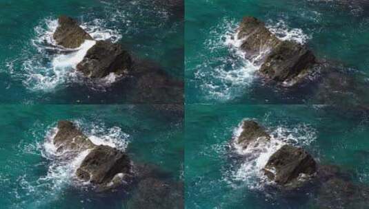 海浪冲击岩石的慢动作镜头高清在线视频素材下载
