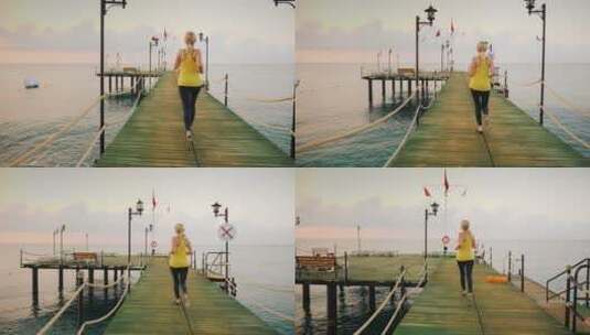 海上栈桥上奔跑的女人高清在线视频素材下载