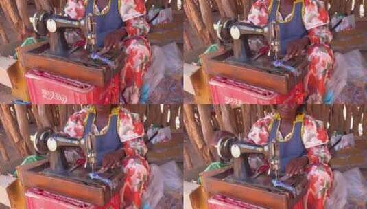 非洲妇女在操作缝纫机高清在线视频素材下载