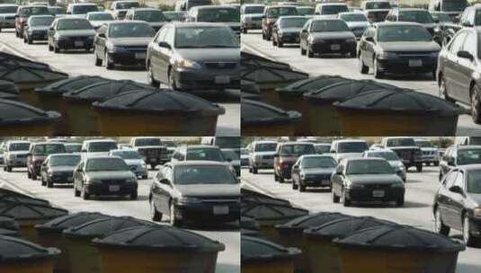 经过高速公路边的大桶的车流高清在线视频素材下载